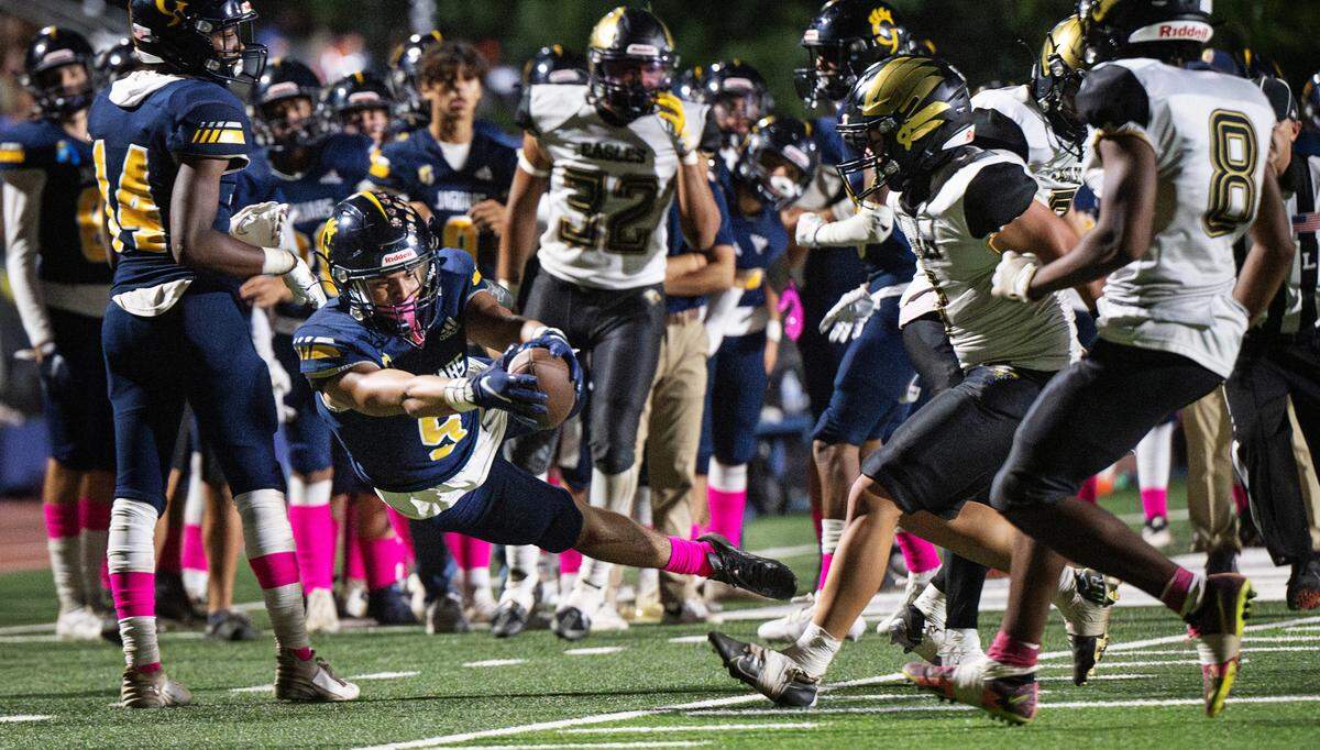 Gregori’s Landon Gutierrez reaches for more yardage during the Central California Athletic League game at Gregori High School in Modesto, Calif., Friday, Oct. 6, 2023.