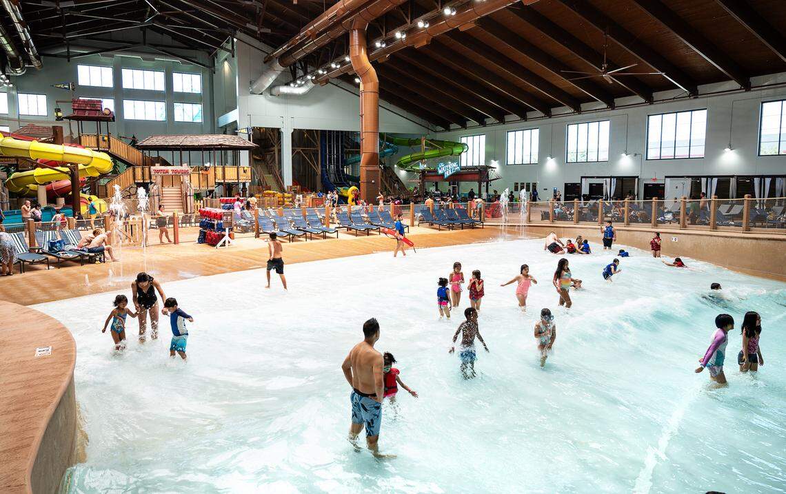 Guests enjoy the wave pool inside Great Wolf Lodge resort in Manteca, Calif., on Tuesday, June 29, 2021.