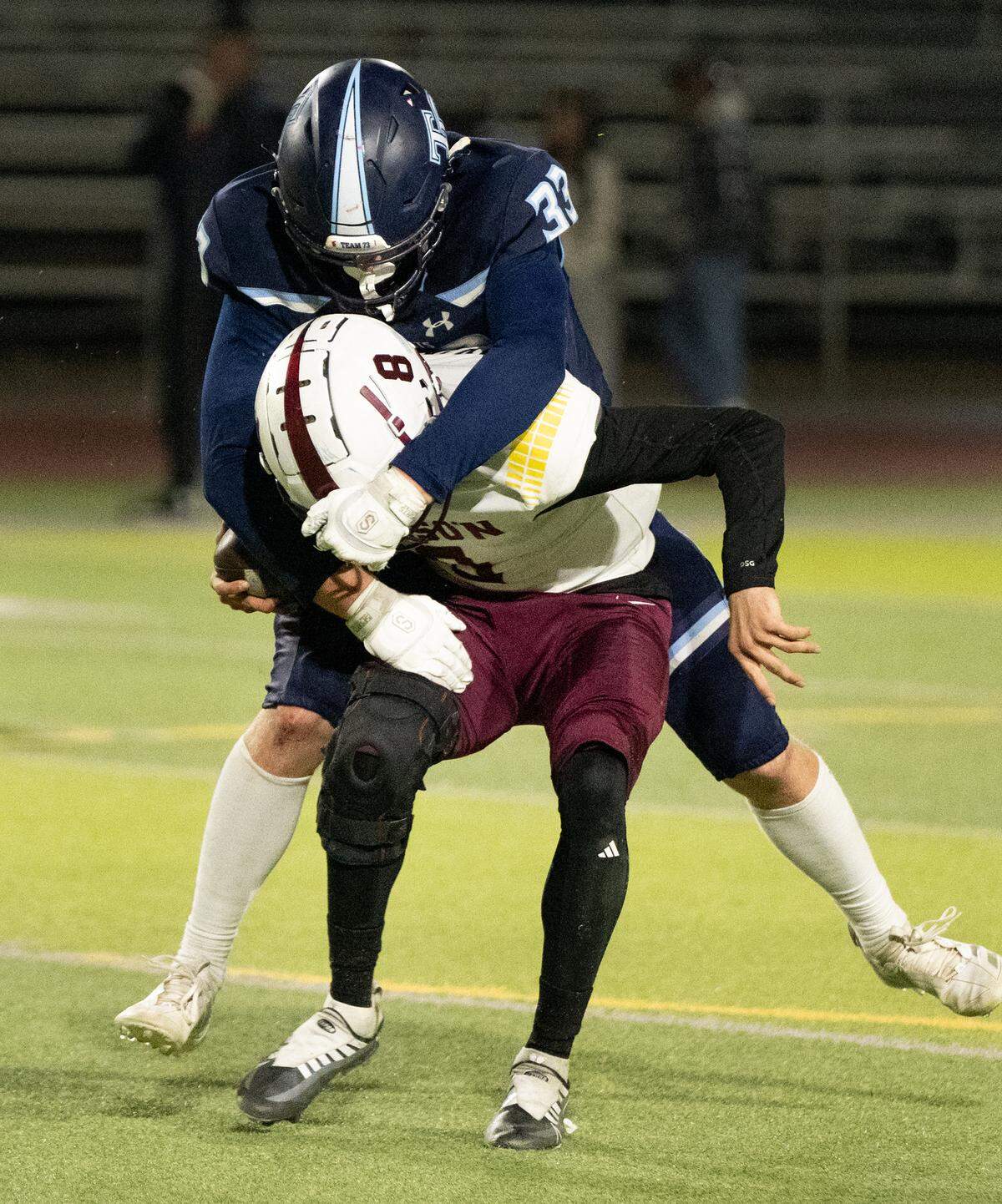 Downey’s Noah Sacuskie sacks Edison quarterback Devin Rasmussen on fourth down during the Sac-Joaquin Section D1 playoff game with Edison at Downey High School in Modesto, Friday, Nov. 8, 2024.