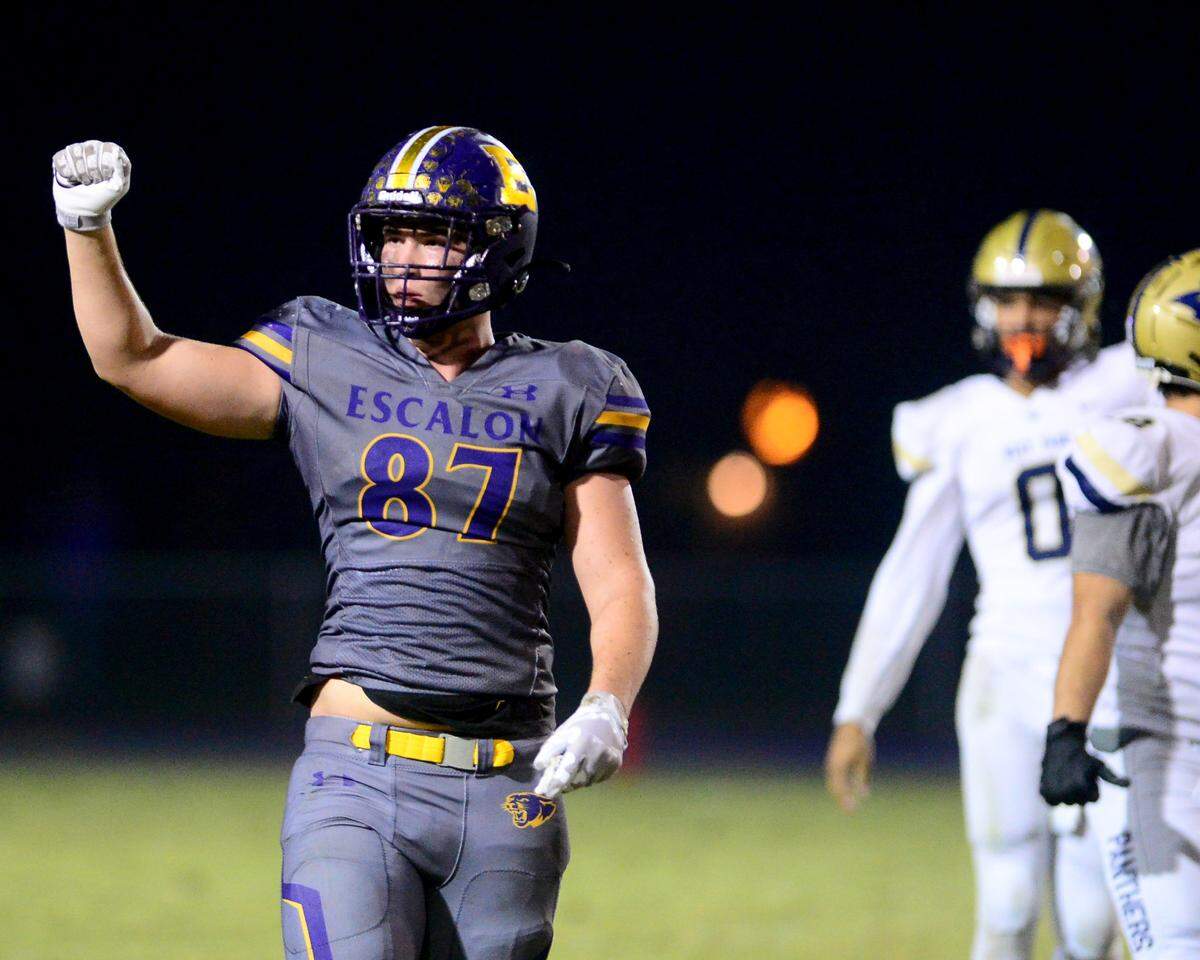 Escalon’s Ryan Lewis (87) celebrates a 4th down stop during a 2023 CIF San Joaquin Section Division IV football game between Escalon and West Park at Escalon High School in Escalon, California, on Nov. 17, 2023. Escalon won the game 48-28.