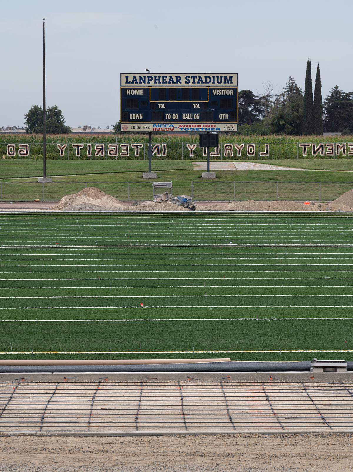 New artificial turf is being installed at Lanphear Stadium at Gregori High School in Salida, Calif., on Friday, August 5, 2022.