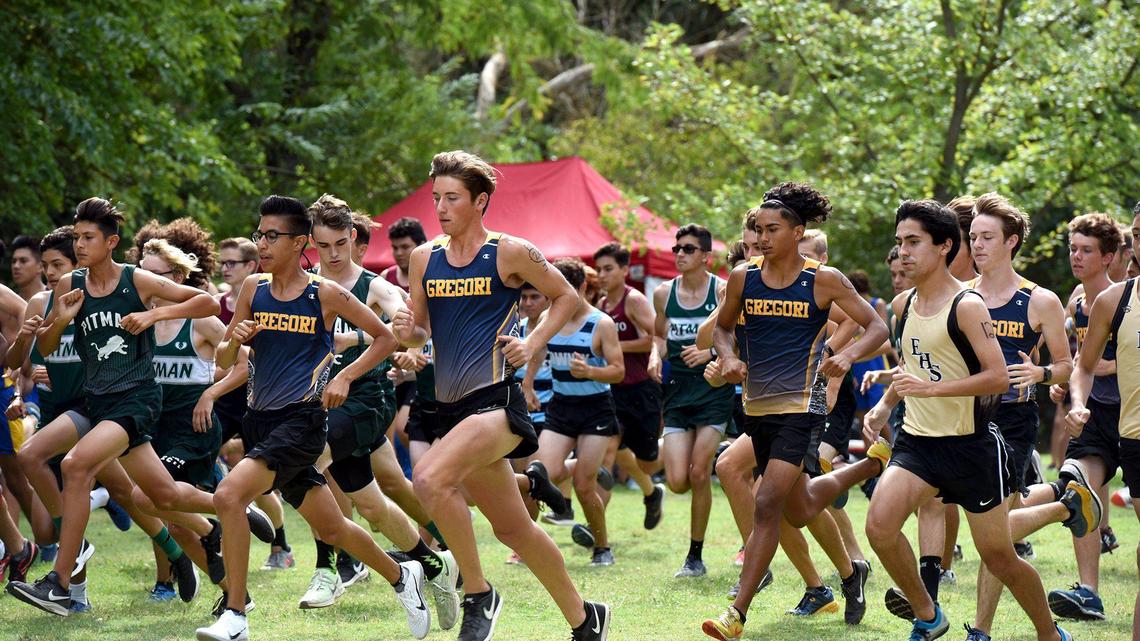 Varsity boys run in the Central California Athletic League cross country meet Wednesday September 18, 2019 at Tuolumne River Regional Park in Modesto, Calif.