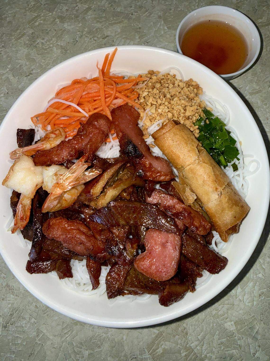A vermicelli noodle salad bowl with shrimp, barbecued pork and pork meatballs from Pho 7 in Modesto