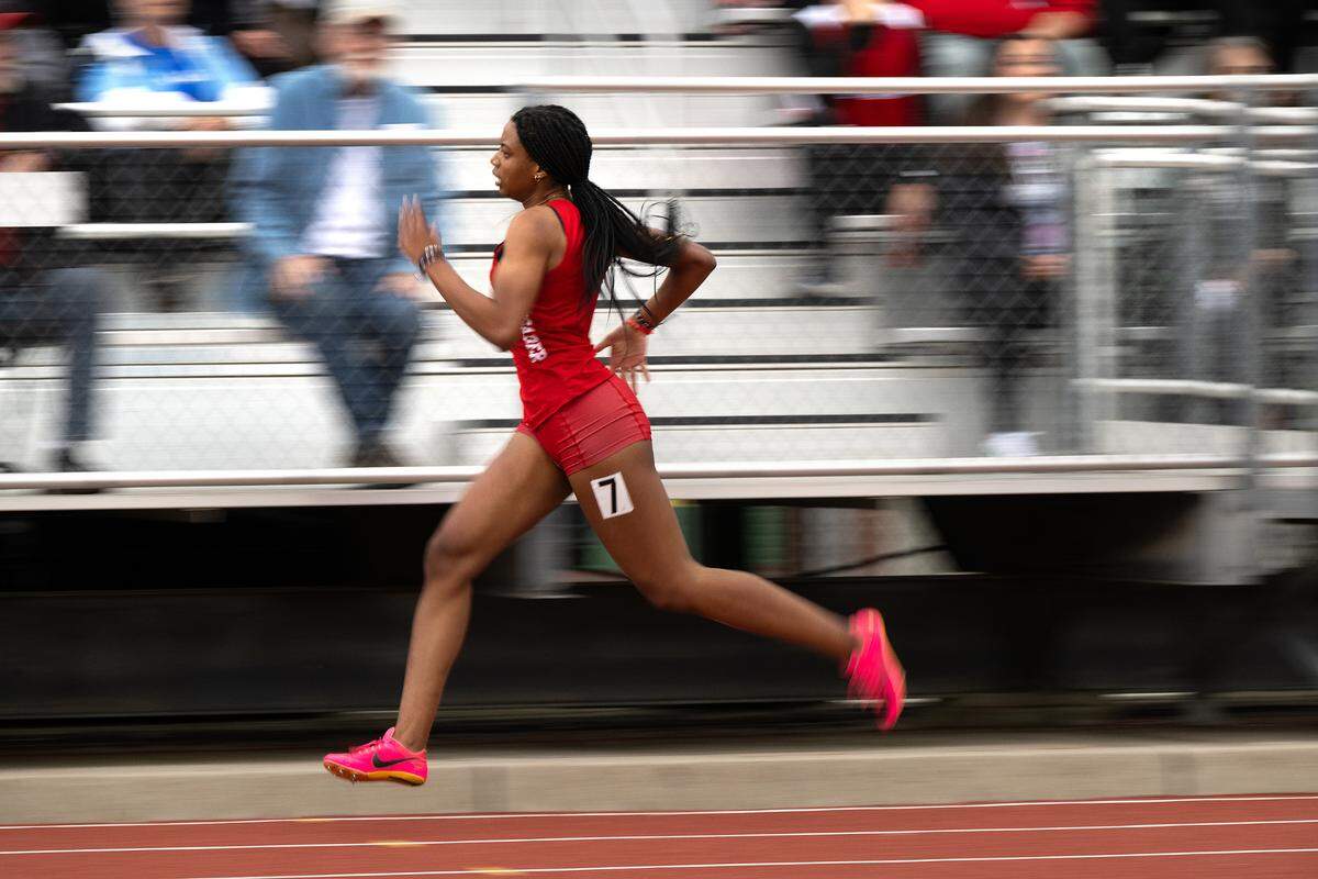 Modesto Christian runner Kylea McNeely finished 8th in the 400 meter race with a time of 63.33 during the County Clash track meet at Oakdale High School in Oakdale, Calif., Friday, March 22, 2024.