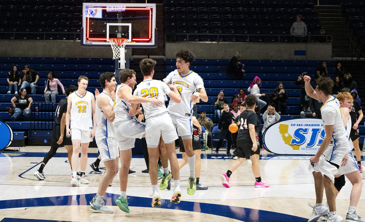 Ripon Christian players celebrate winning the Sac-Joaquin Section Division V championship game over Futures at UC Davis on Friday.