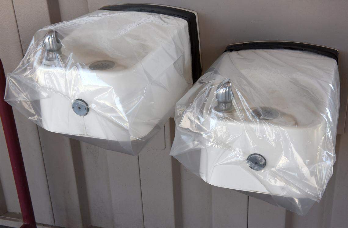 Outside water fountains are covered with plastic at Shiloh elementary in Modesto.