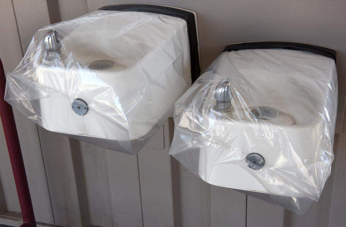 Outside water fountains are covered with plastic at Shiloh elementary in Modesto.