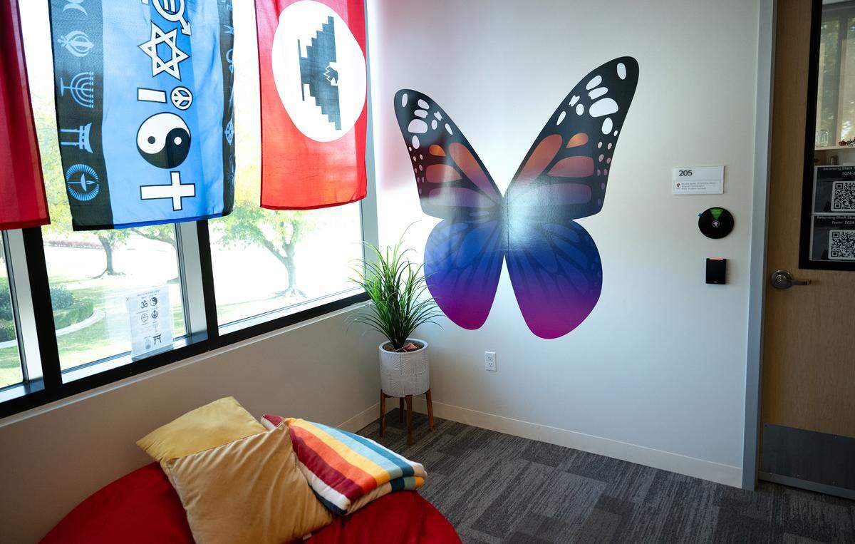 Pasted on the wall in the Warrior Cross Cultural Center, the Monarch butterfly is symbolic of immigration and migrant justice at Stanislaus State University in Turlock Wednesday, Dec. 11, 2024.