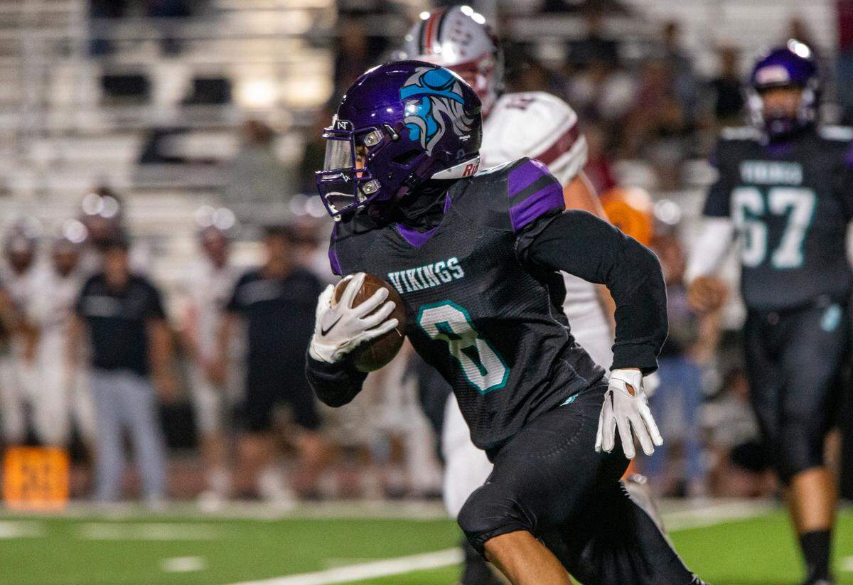 Tek Garcia, 8, of Johansen High works his way up field Friday Sept. 1, 2023 night against Bear River at Johansen.