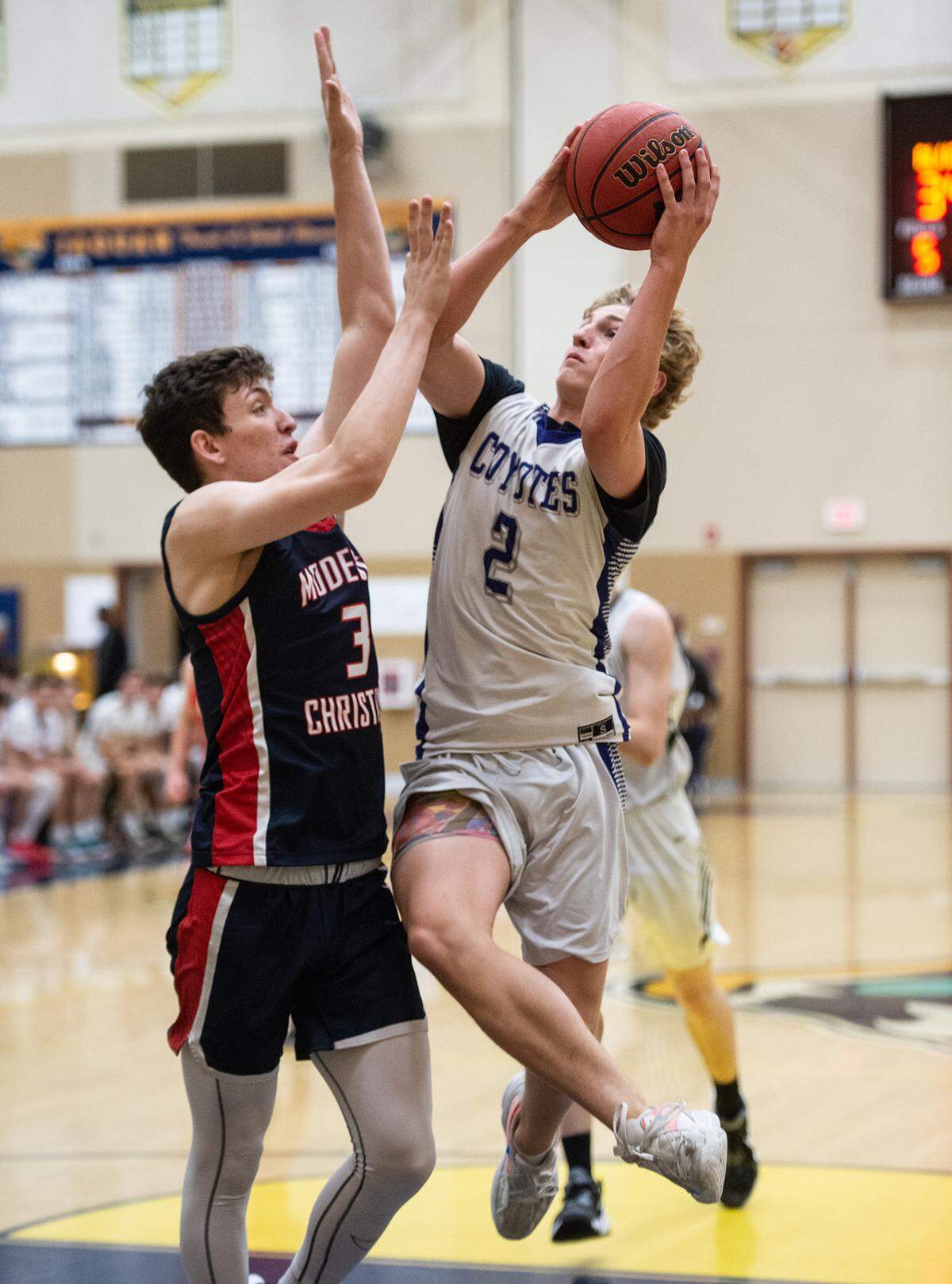 Denair’s Cooper Feldman shoots over Modesto Christian’s Austin Moore during the Six-County Senior All-Star Basketball Game at Gregori High School in Salida, Friday, May 6, 2022.