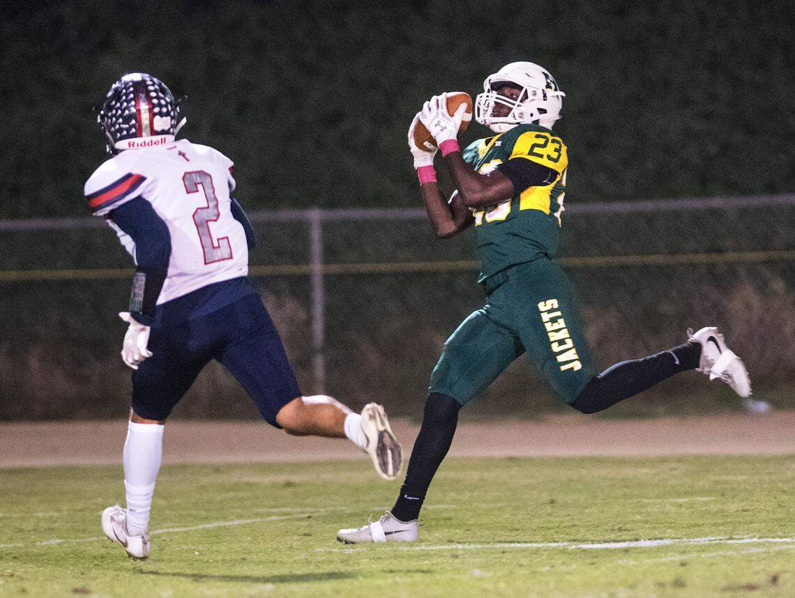 Hilmar’s Issac Sharp makes a 55-yard touchdown catch during the Trans Valley League game with Modesto Christian at Hilmar High School in Hilmar, Calif., on Friday, Oct. 12, 2018. Modesto Christian won the game 24-21.