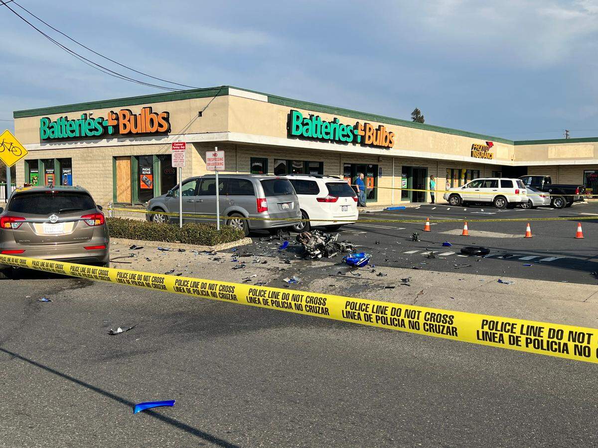 Modesto police investigate a fatal accident involving a motorcycle and a car Saturday afternoon on McHenry Avenue in Modesto, Calif. Jan. 15, 2022