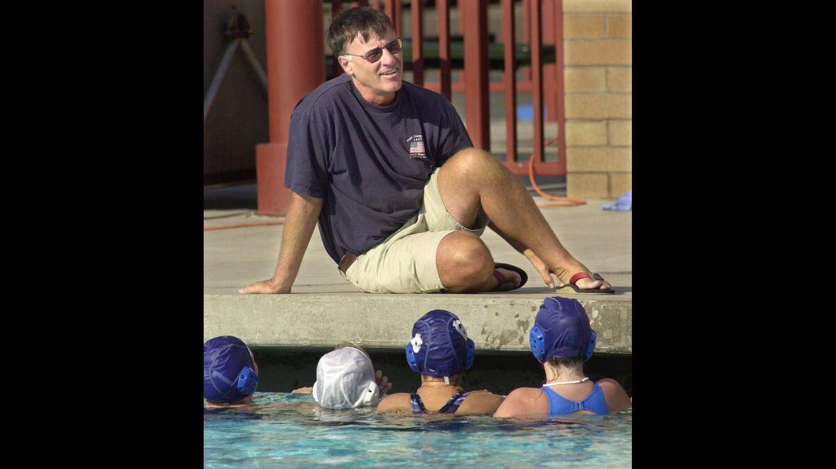 Brent Bohlender, the water polo coach at Johansen High School will be inducted into the US Water Polo Hall of Fame next year. He is pictured at a practice at the high school Thursday afternoon (07-12-01).