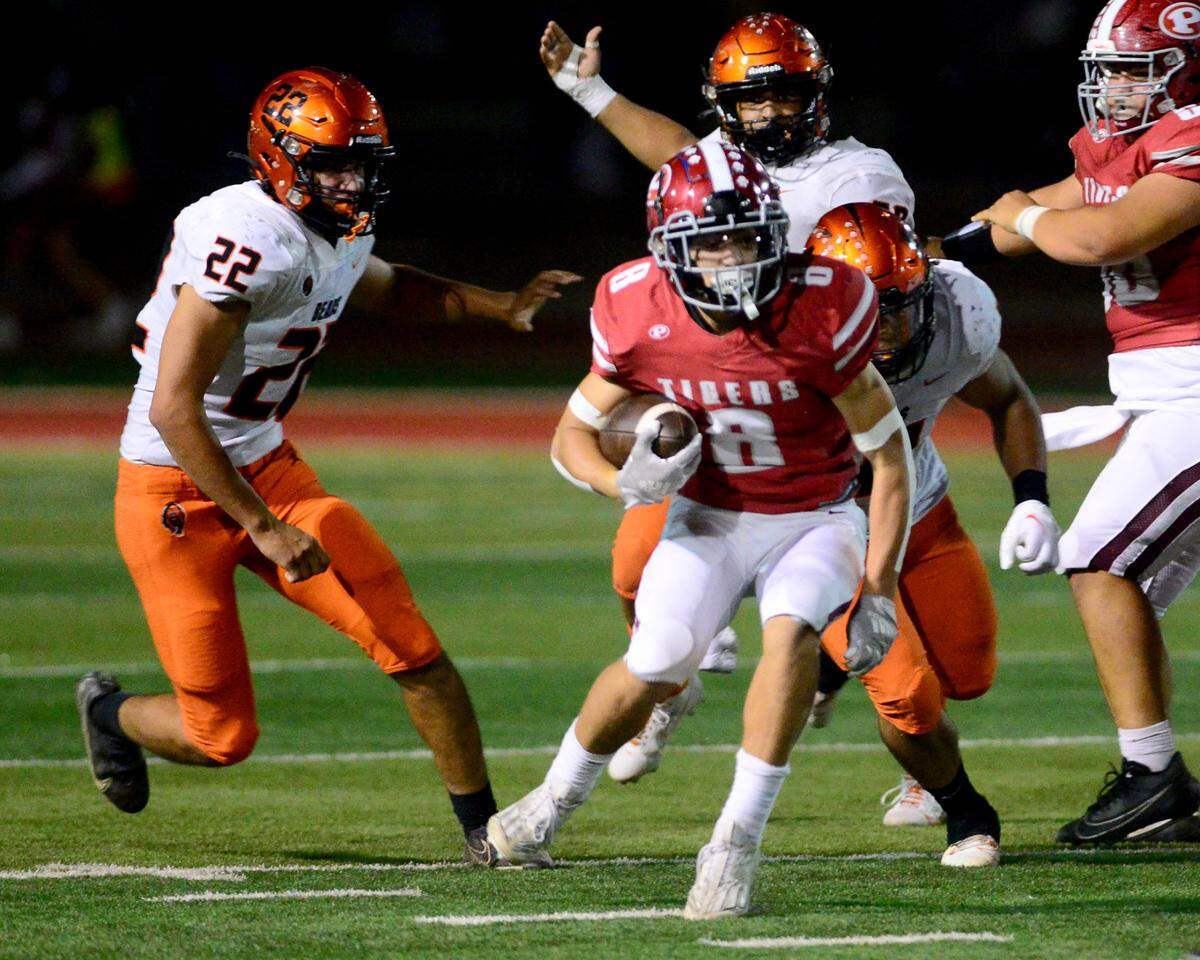Patterson running back Coby Joseph (8) makes it to the second level of the defense during a game between Patterson and Merced at Patterson High School in Patterson California on September 29, 2023.