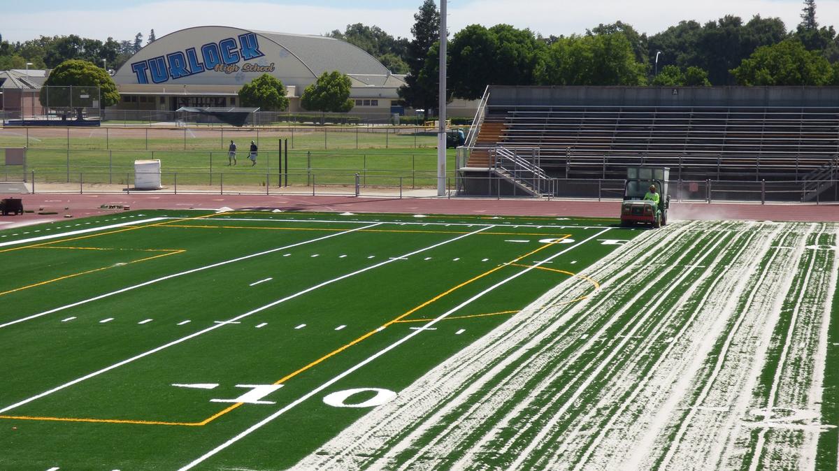 Joe Debely Stadium turf replacement at Turlock High School.
