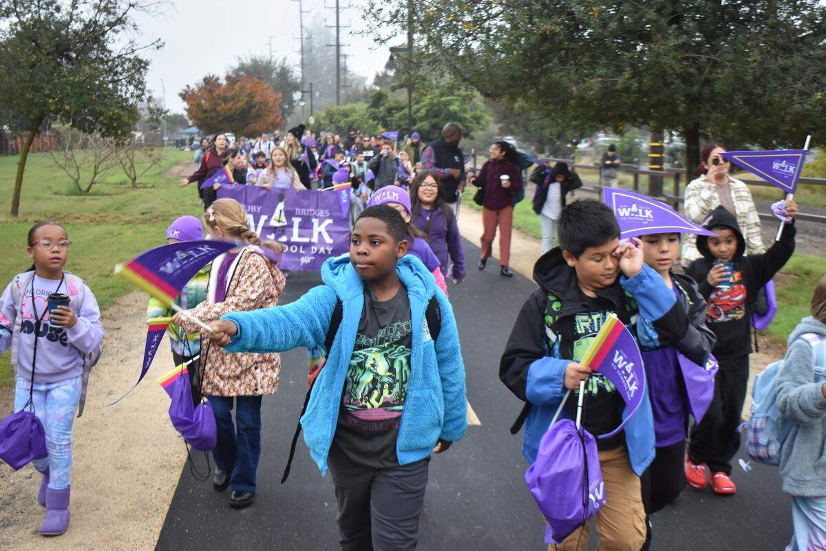 Students at Woodrow Elementary celebrated Ruby Bridges Walk to School Day on Friday, Nov. 14, 2025, by walking a short distance on the Virginia Corridor Trail from Rumble Road to their school. The national event is held annually on Nov. 14 to honor civil rights icon Ruby Bridges and her historic walk to an all-white school in 1960.