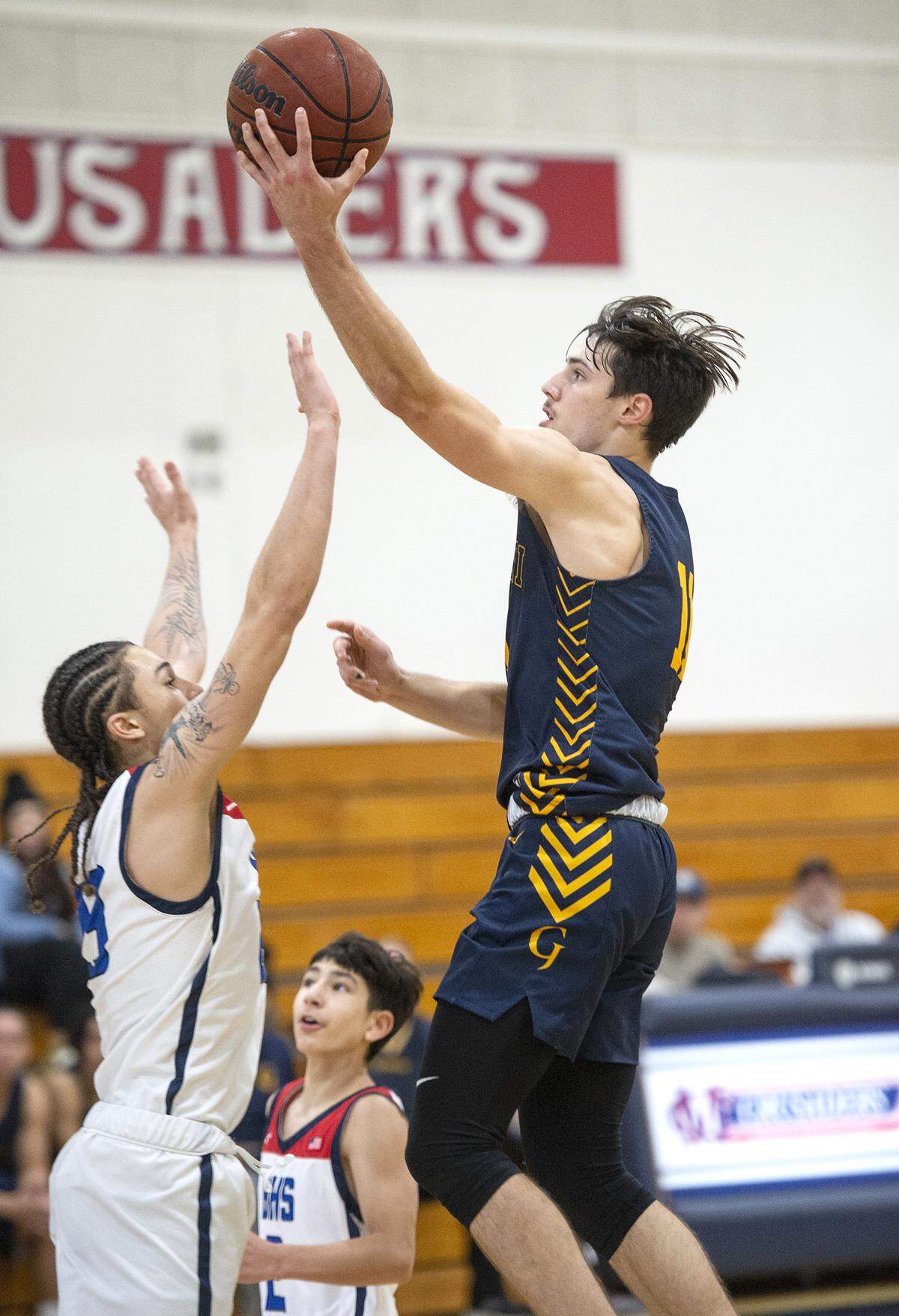 Gregori’s Kyle Monk scores over Beyer’s Gio Primofiore during the Holiday Hoop Classic at Modesto Christian High School in Salida, Calif., on Tuesday, Dec. 28, 2021.