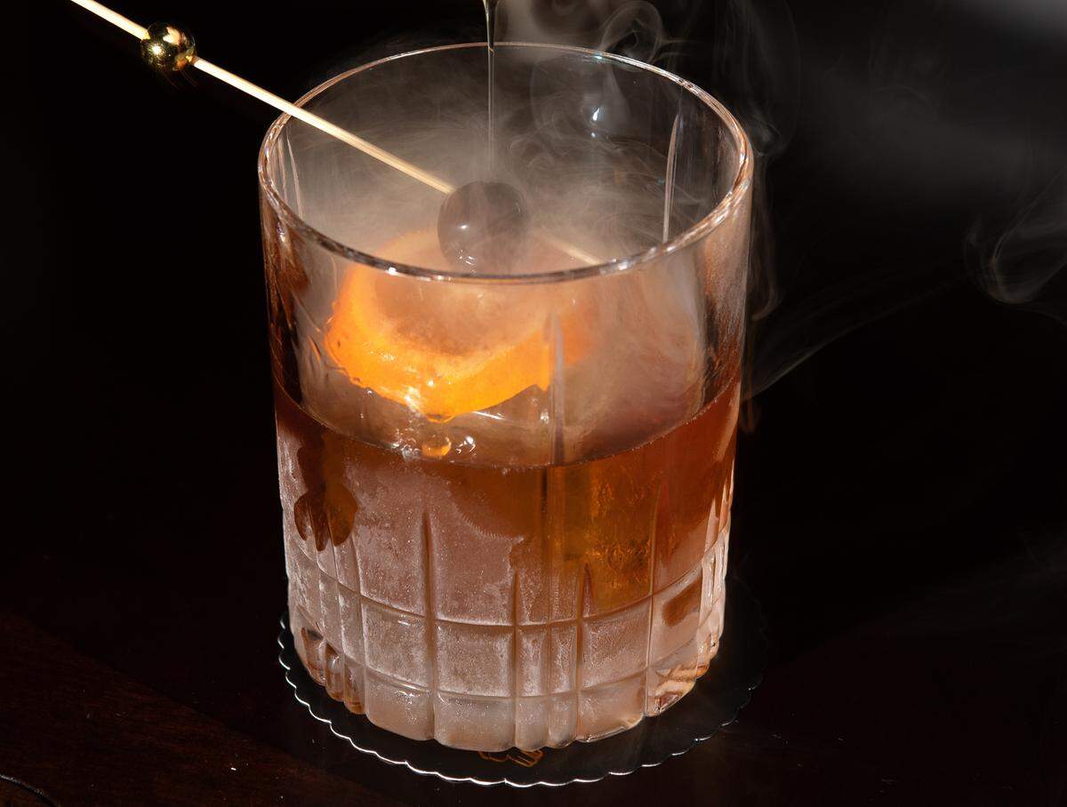 Smoked Old Fashioned cocktail at the Falcon’s Lair in Ripon, Calif., Thursday, March 30, 2023.