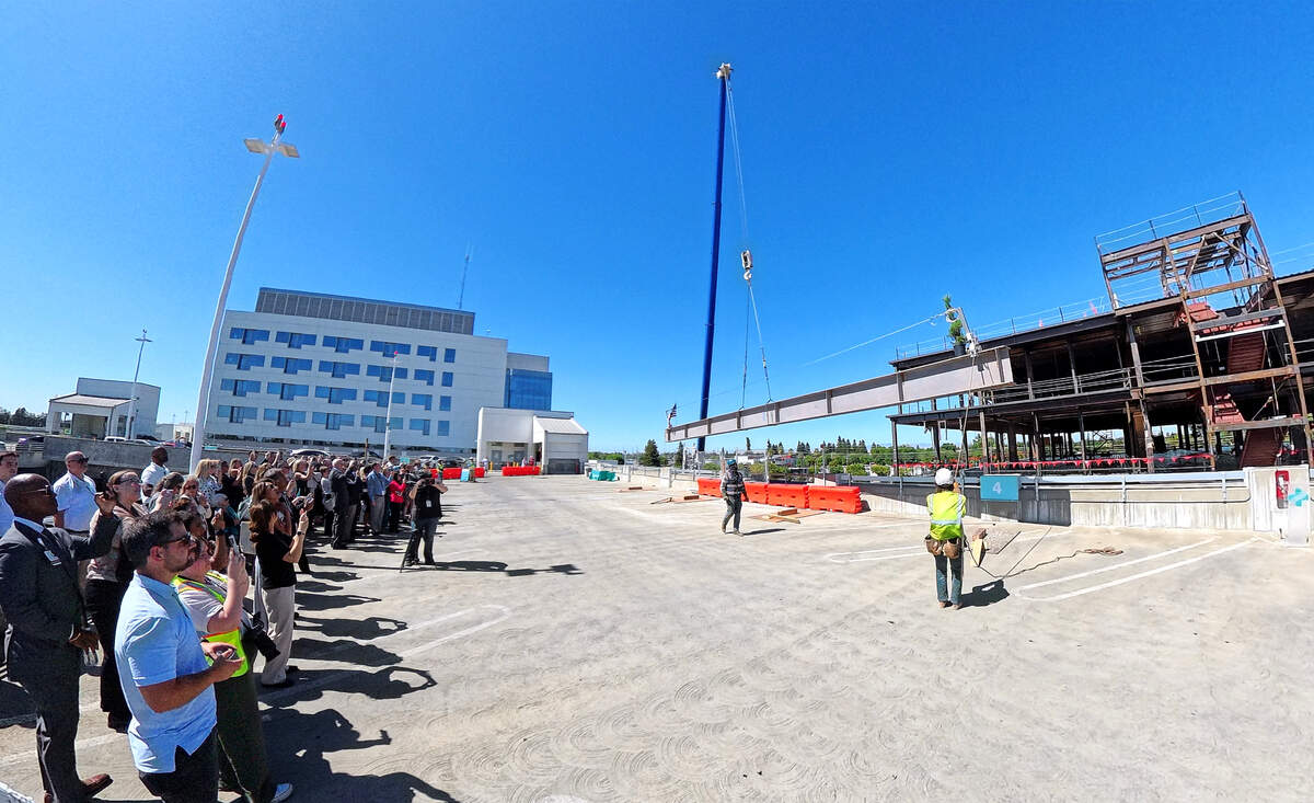 The final beam is placed on the Modesto Advanced Cancer Center and Care Complex during a ceremony at Sutter Memorial Medical Center in Modesto, July 17, 2026.