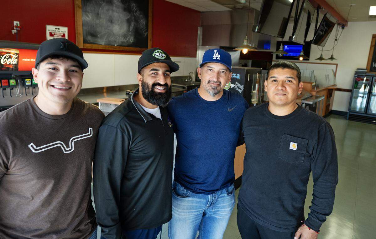 From the left, Chris Sanchez, Amarjit Singh Malhi, Andy Sanchez and Juan Manuel Ruiz Jr. are working to open Tacos El Viejon restaurant in Ceres, Tuesday, May 20, 2025. The restaurant will open next to Flyers, a gas station and convenience store on East Whitmore Avenue.