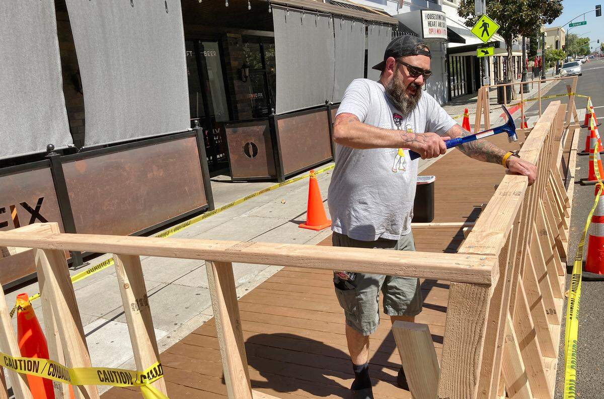 Food fix owner Hank Olson is building a parklet for outdoor dining in Modesto, Calif., on August 12, 2020.