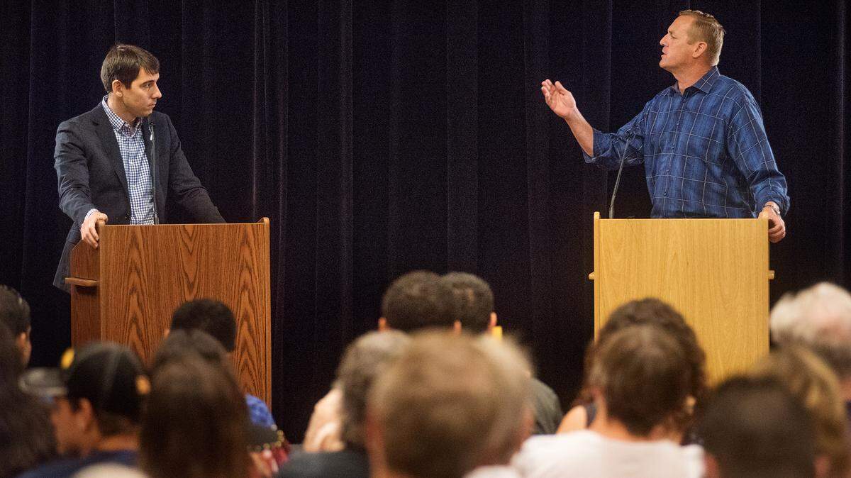 Republican Rep. Jeff Denham, right, and Democratic challenger Josh Harder, left, debate at the Carnegie Center in Turlock, Calif., on Saturday, Sept. 22, 2018. 