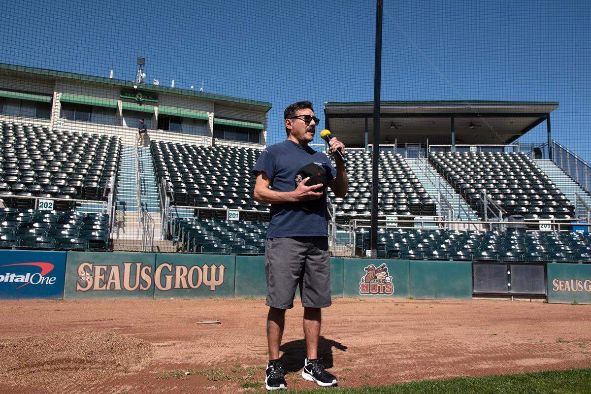 Robert Linan of Turlock performs the national anthem during a tryout for the chance to sing during a Modesto Nuts game this season. Photographed at John Thurman Field in Modesto, Calif., Thursday, March 16, 2023.