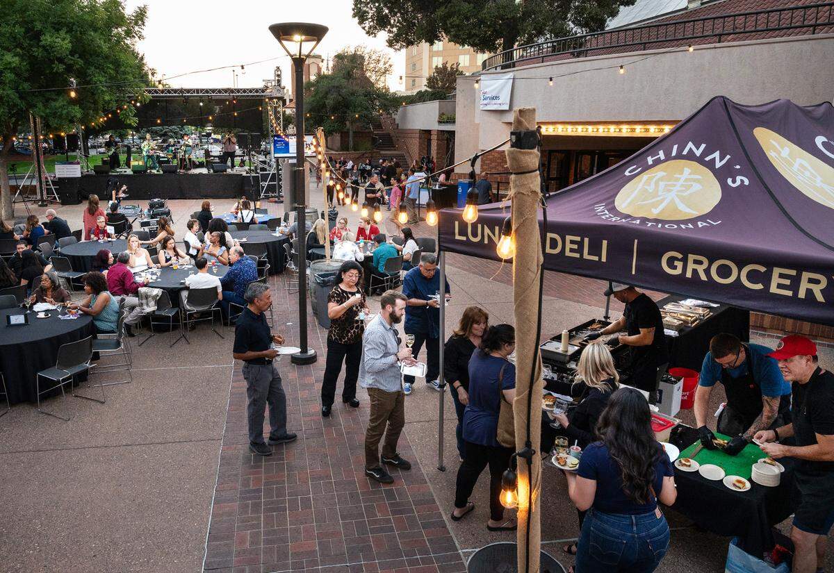 Guests line up to sample food from Chinn’s International during Edible Extravaganza fundraising event for the Center for Human Services in Modesto, Calif., Thursday, Oct. 5, 2023.