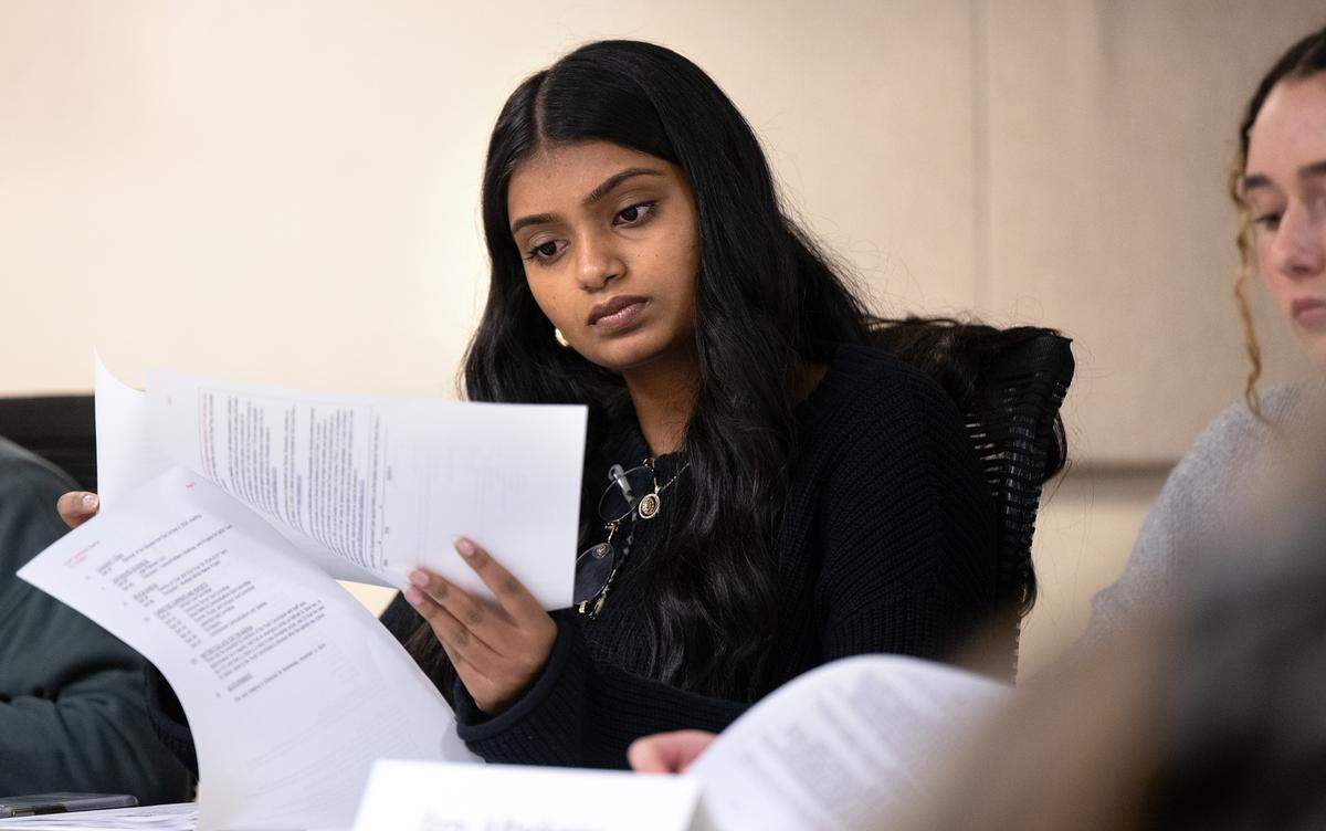 Youth Commission member Neha Prabhakar looks over the agenda during a meeting of the commission in Modesto, Wednesday, Nov. 13, 2024.