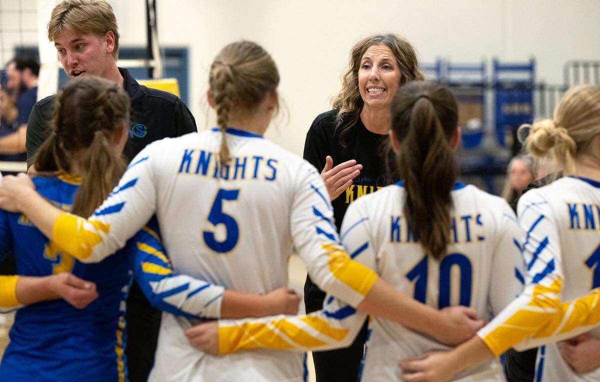 Ripon Christian coach Kayla Kootstra talks with her players during the Sac-Joaquin Section Division III quarterfinal playoff match with Central Catholic at Ripon Christian High School in Ripon, Thursday, Oct. 31, 2024.