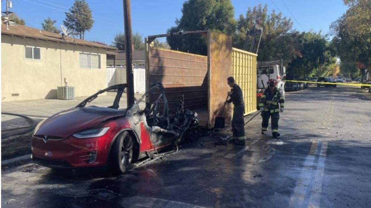 A fully engulfed Tesla was extinguished, loaded into a metal container for safety reasons and taken from the intersection of Carver Road and Roseburg Avenue in Modesto on Monday.