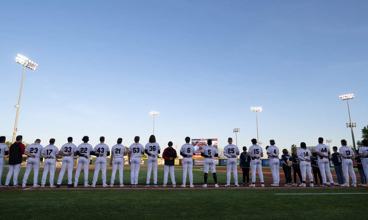 Modesto Nuts team stands for the National Anthem during season home opener with Lake Elsinore at John Thurman Field in Modesto, Calif., Tuesday, April 9, 2024.
