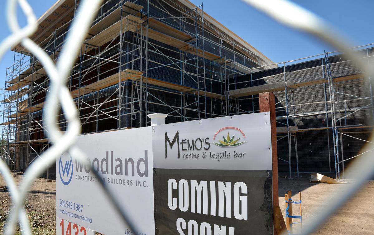 A sign announcing the new Memo’s on Sylvan Avenue in Modesto, Calif. May 27, 2021.