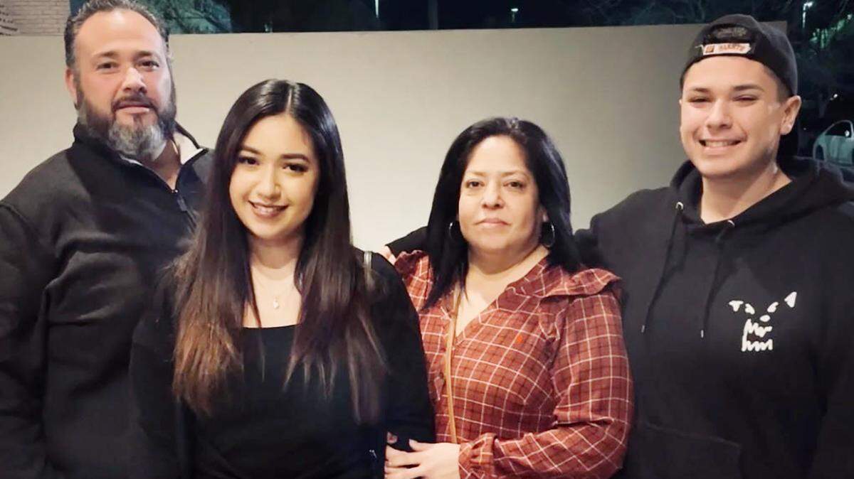Anaissa Medina, second from left, received a full-tuition scholarship from Sutter Health to attend medical school. She is pictured with her father, Ernesto, mother, Lorena, and younger brother.