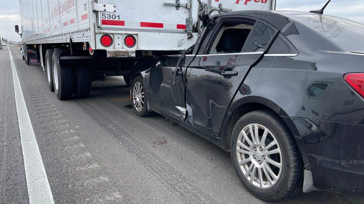 The driver of this Chevrolet Cruze was taken by air ambulance after crashing into the rear of a semi on Highway 99 in Turlock on Tuesday morning, Feb. 9, 2021.