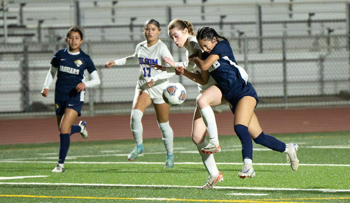 Gregori’s Grace Rodriguez battles for the ball with Folsom’s Ella Hershey in the Sac-Joaquin Section Division I semifinal match at Gregori High School in Modesto, Wednesday, February, 26, 2025.