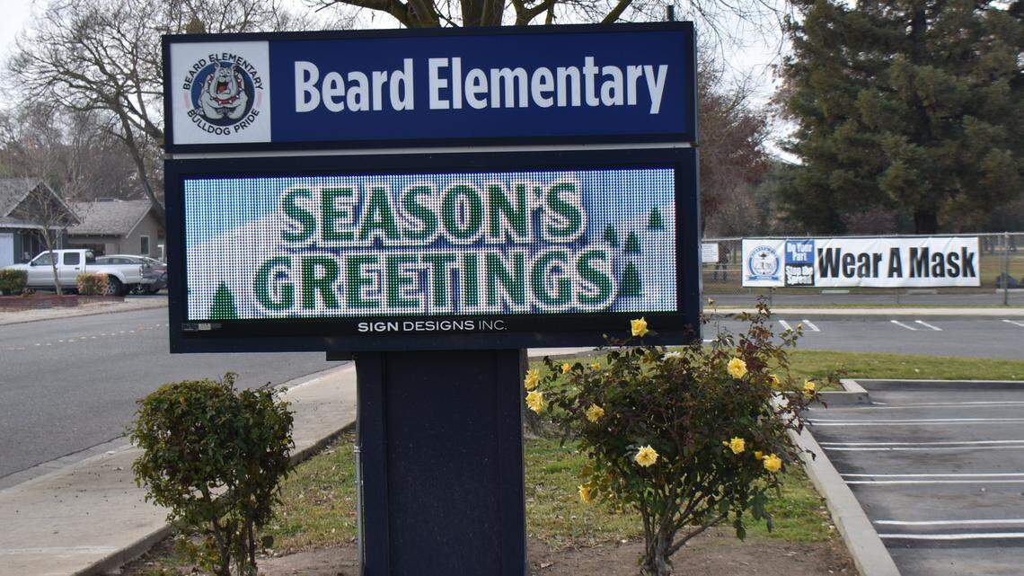 Signs at Modesto City Schools’ Beard Elementary share messages for the holidays and for health.
