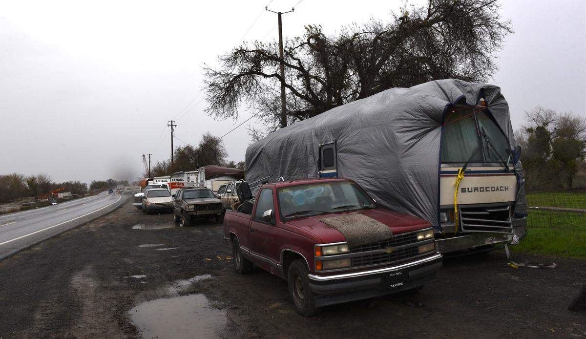The Catfish Camp mobile home park along the San Joaquin River at Crows Landing Road is pictured Wednesday, Jan. 11, 2023. Residents are under an evacuation order.