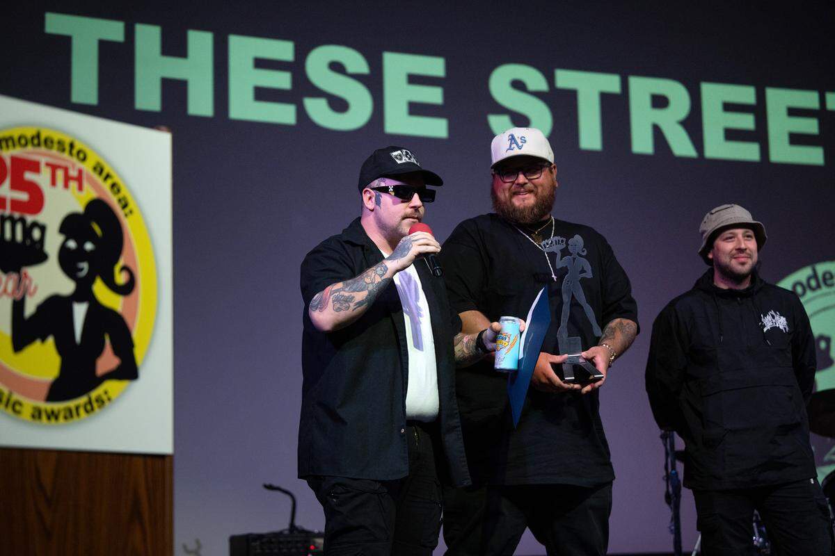 Members of the These Streets accept the award for best punk band during the Modesto Area Music Association’s MAMA awards show at the State Theatre in Modesto, Tuesday, Oct. 15, 2024.