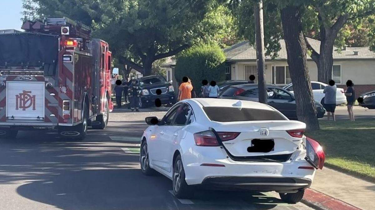 This image edited by the Modesto Fire Department to obscure license plates and identities shows the scene of a fatal crash Saturday afternoon, Aug. 19, 2023, at Tully Road and Oakwood Drive.