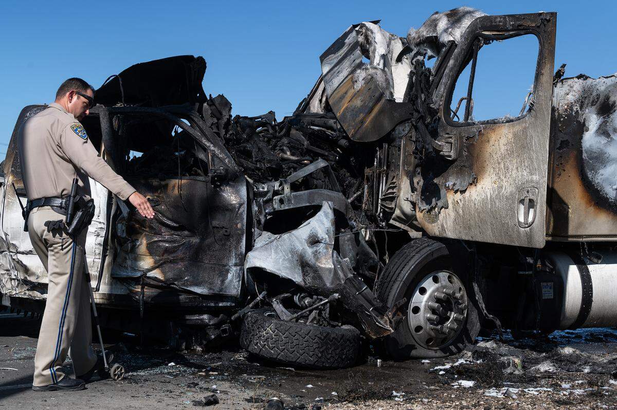 California Highway Patrol officer investigates a fatal accident on Grayson Road east of Grayson, Calif., on Thursday, September 22, 2022.