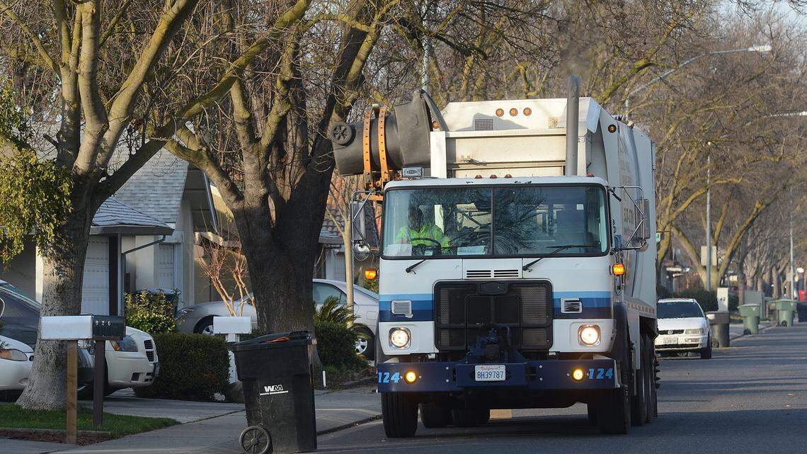 A Gilton Solid Waste Management truck picks up garbage in 2013 in Modesto. Garbage trucks are included in the state’s Advanced Clean Fleets plan, and the state is attempting to create a 100% electric governmental fleet. 