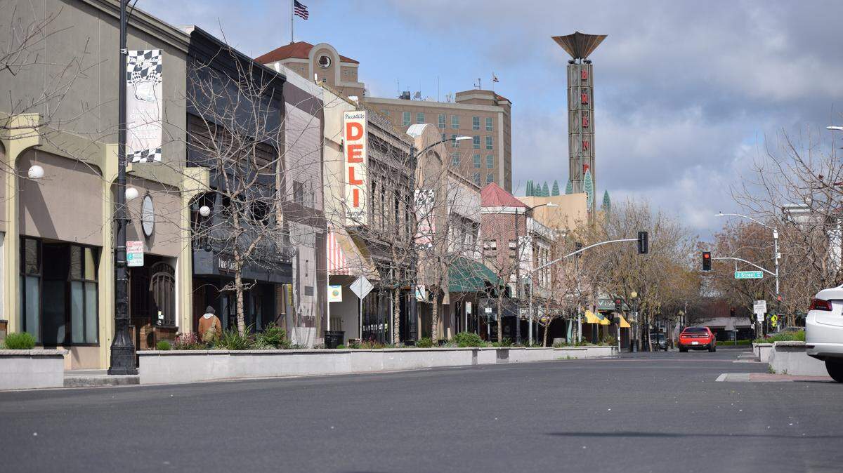After California Governor Gavin Newsom issued a stay-at-home order to slow the spread of the coronavirus, there were few people walking around downtown Modesto on Monday, Mar. 23, 2020.