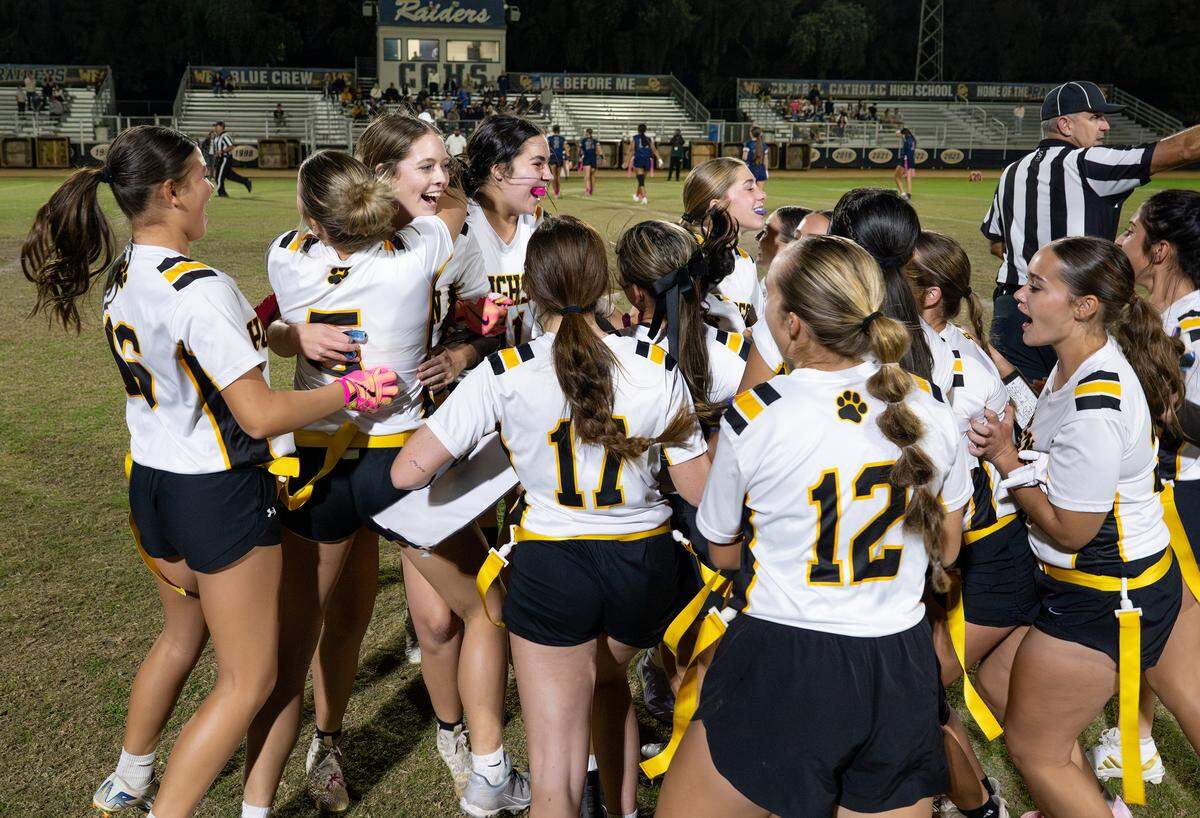 Hughson players celebrate their 13-12 win over Central Catholic in the Sac-Joaquin Section Division IV playoff game at Central Catholic High School in Modesto on  Wednesday, Oct. 29, 2025.