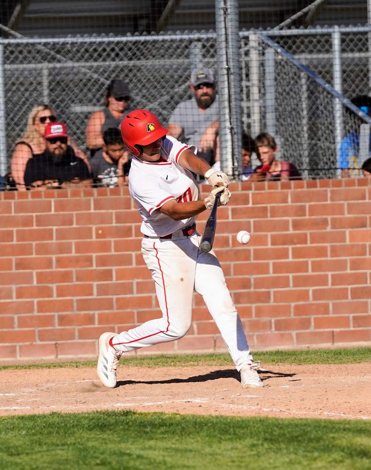 Oakdale’s Gavin Wyatt makes contact with a pitch during the Sac-Joaquin Section Division IV baseball quarterfinals against East Union at Oakdale High School on Friday, May 9, 2025.