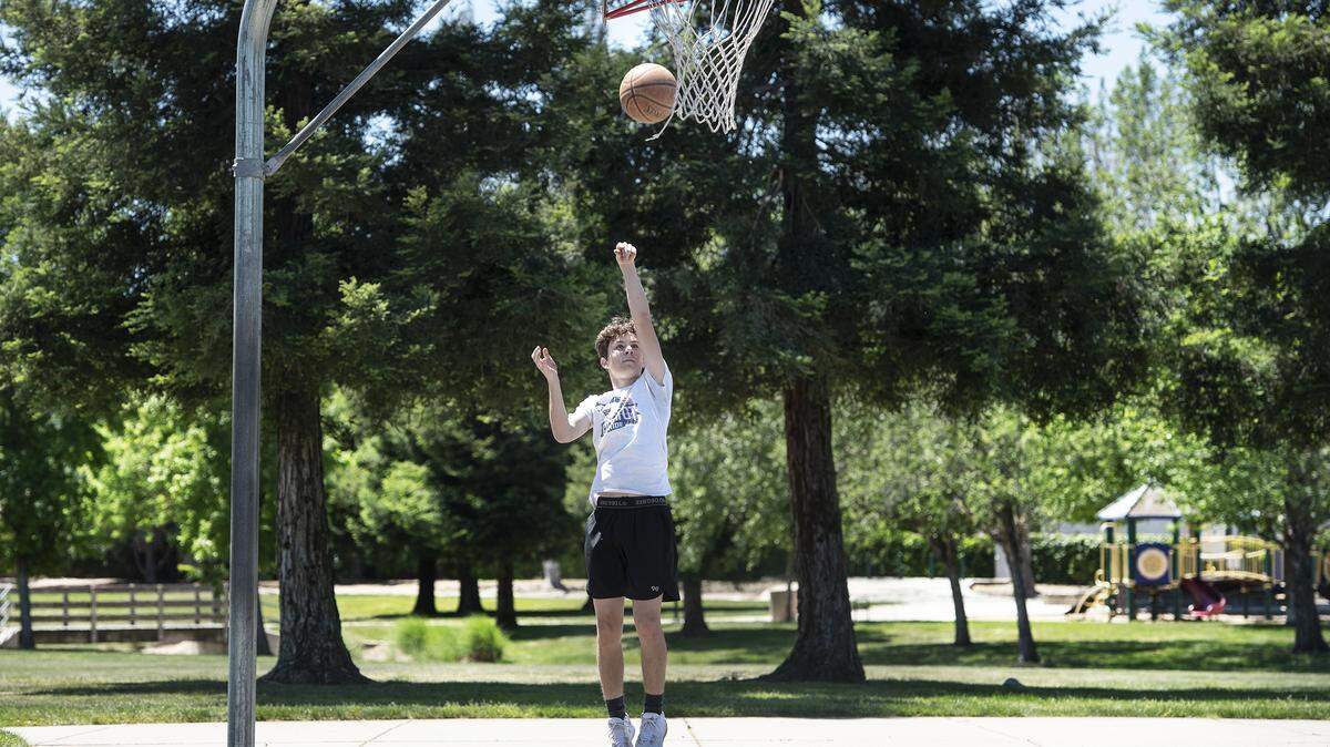 Bryce Foehringer, 15, practices basketball at Coffee-Claratina Park in Modesto, Calif., on Tuesday, April 28, 2020. Foehringer was a starter on the Beyer High freshman team and plans to tryout for the JV team next season.