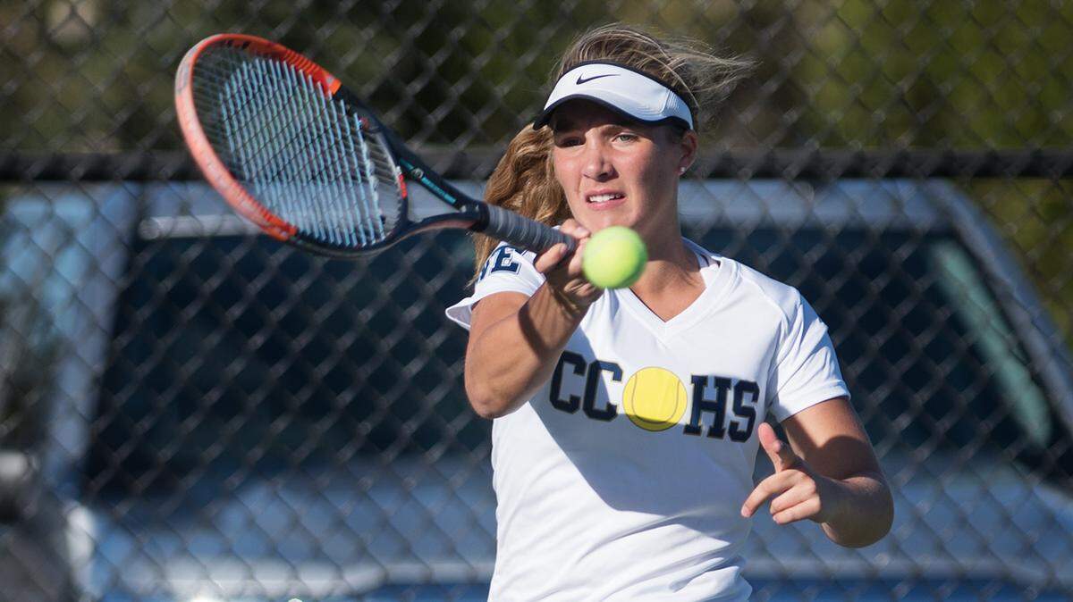 No. 1 singles player Colleen Ballatore hits a forehand during the Sac Joaquin Division IV playoff match with Placer at Central Catholic High School in Modesto, Calif., Tuesday, Nov. 6, 2018.