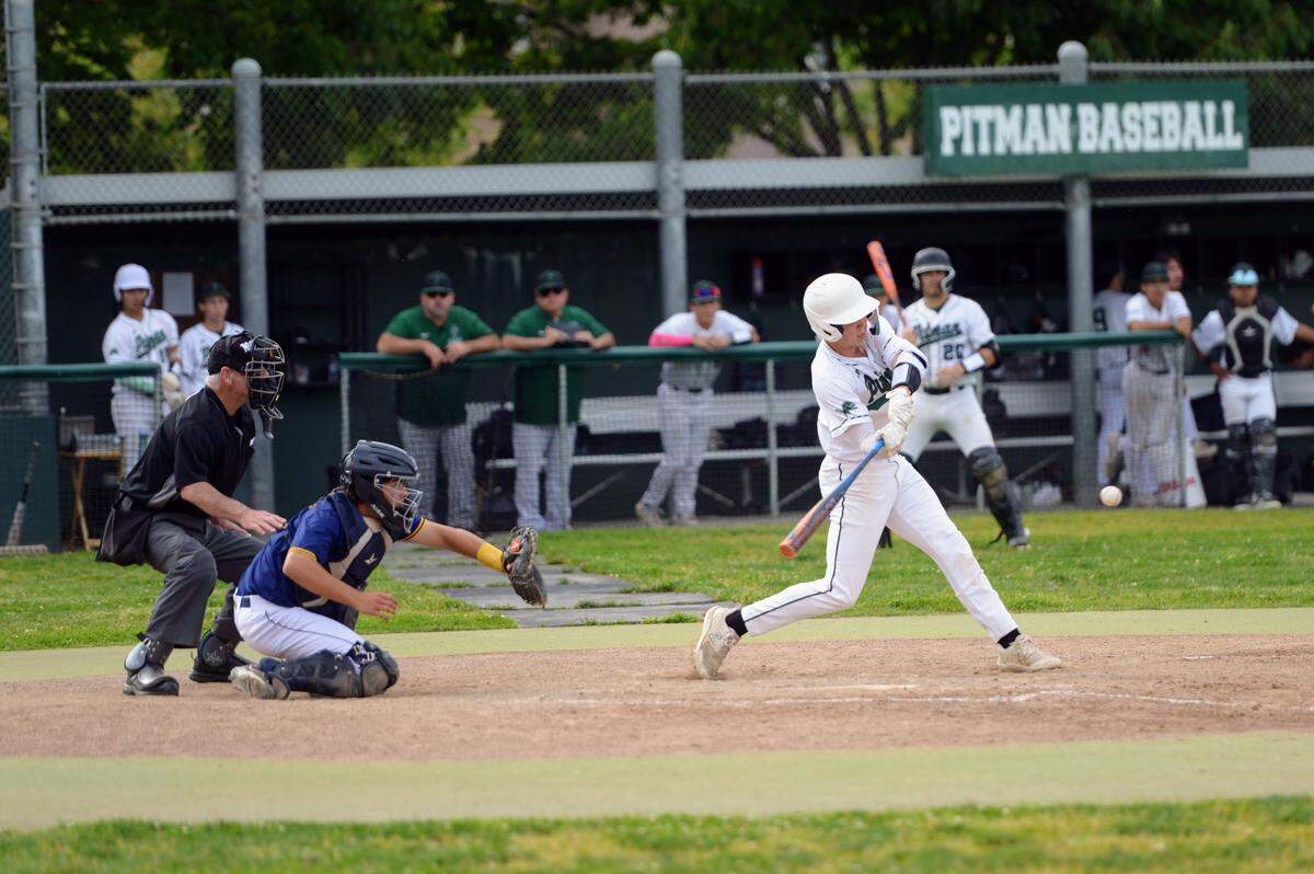 Pitman’s Jackson Way makes contact with a pitch during a CCAL matchup with Gregori at Pitman High School in Turlock, Calif. on Wednesday, April 24, 2024.