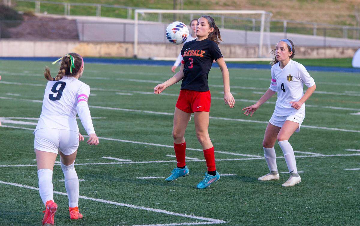 Oakdale High’s Mia Peterson, 3, controls the ball during the Sac-Joaquin Section Division III Section Championship match against Rio Americano Thursday Feb. 22, 2024 at Cosumnes River College.