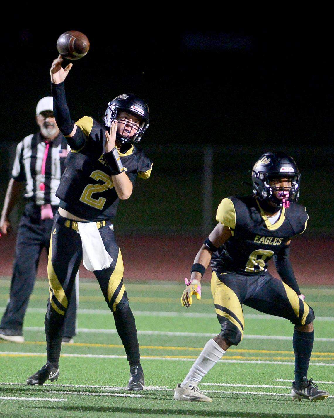 Enochs quarterback Johnny Staggs (2) throws the ball to the flat during a game between Modesto High School and Enochs High School at Gregori High School in Modesto, CA on October 4, 2024.